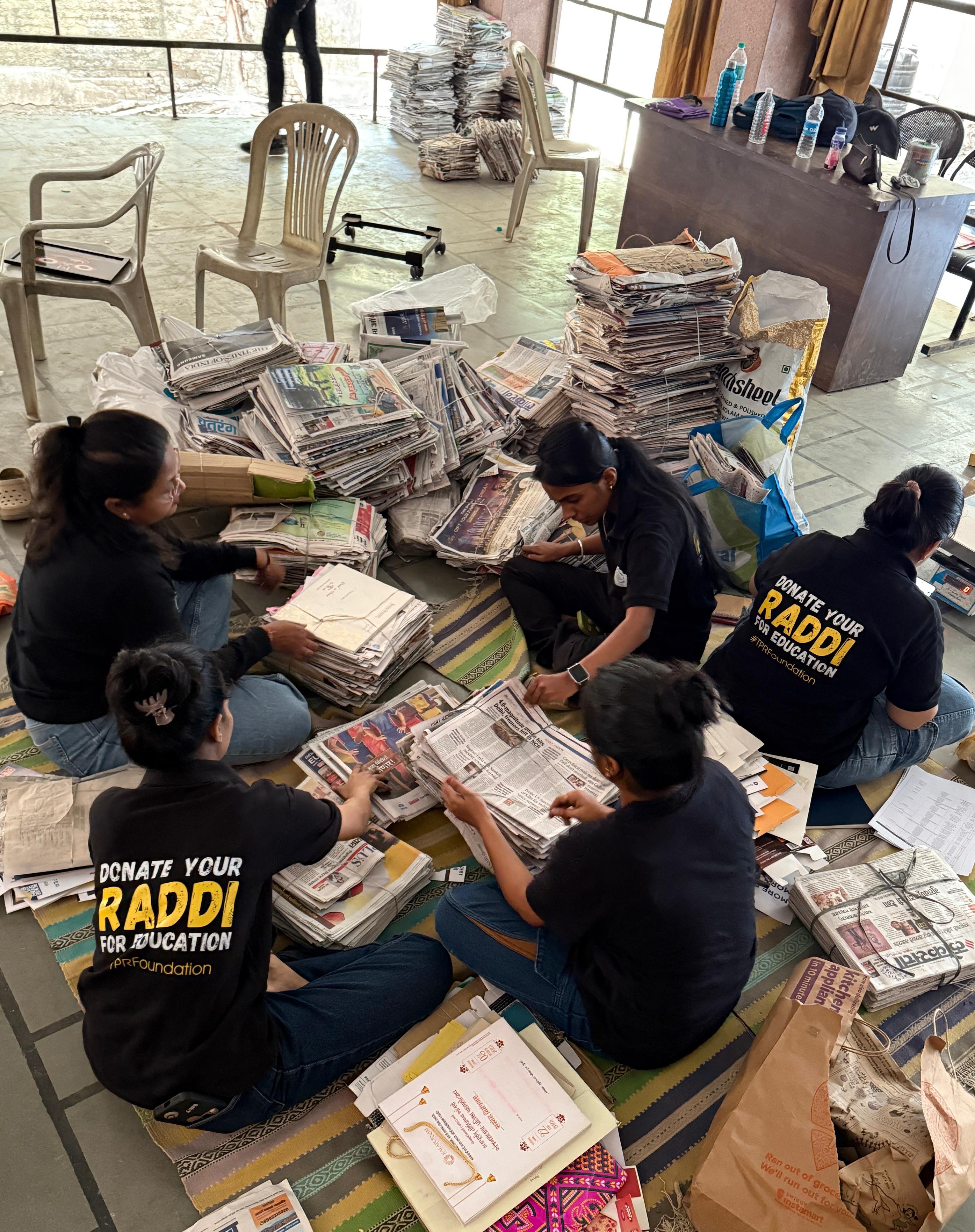 Team collecting raddi and teaching children